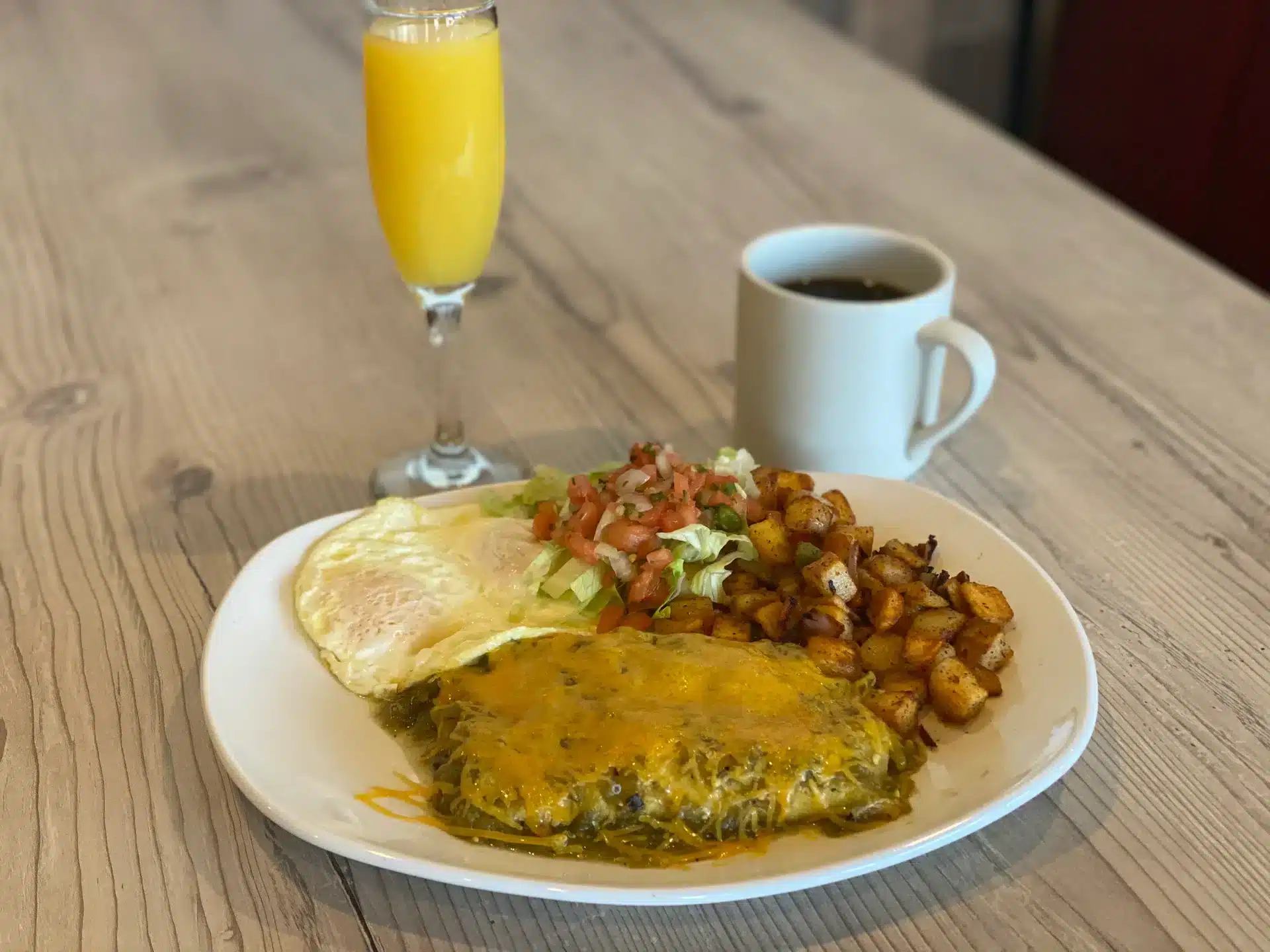 Dirty Birdies Sports Bar & Grill - Pork Enchiladas & Eggs
